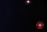 Image of descending parachute flares Vietnam Bien Hoa Air Base, 1967, second 56 stock footage video 65675052031