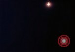 Image of descending parachute flares Vietnam Bien Hoa Air Base, 1967, second 57 stock footage video 65675052031