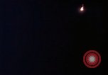 Image of descending parachute flares Vietnam Bien Hoa Air Base, 1967, second 59 stock footage video 65675052031