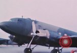 Image of camouflaged AC 47 aircraft Vietnam Bien Hoa Air Base, 1967, second 7 stock footage video 65675052032