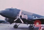 Image of camouflaged AC 47 aircraft Vietnam Bien Hoa Air Base, 1967, second 8 stock footage video 65675052032