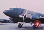 Image of camouflaged AC 47 aircraft Vietnam Bien Hoa Air Base, 1967, second 14 stock footage video 65675052032