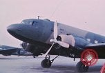 Image of camouflaged AC 47 aircraft Vietnam Bien Hoa Air Base, 1967, second 17 stock footage video 65675052032