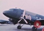 Image of camouflaged AC 47 aircraft Vietnam Bien Hoa Air Base, 1967, second 18 stock footage video 65675052032