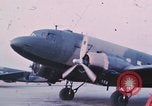 Image of camouflaged AC 47 aircraft Vietnam Bien Hoa Air Base, 1967, second 19 stock footage video 65675052032
