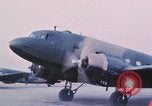 Image of camouflaged AC 47 aircraft Vietnam Bien Hoa Air Base, 1967, second 23 stock footage video 65675052032