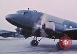 Image of camouflaged AC 47 aircraft Vietnam Bien Hoa Air Base, 1967, second 24 stock footage video 65675052032