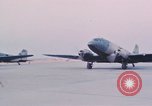 Image of camouflaged AC 47 aircraft Vietnam Bien Hoa Air Base, 1967, second 27 stock footage video 65675052032