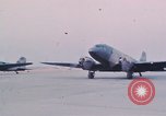 Image of camouflaged AC 47 aircraft Vietnam Bien Hoa Air Base, 1967, second 28 stock footage video 65675052032
