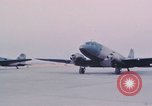Image of camouflaged AC 47 aircraft Vietnam Bien Hoa Air Base, 1967, second 29 stock footage video 65675052032