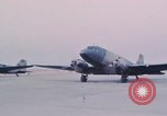 Image of camouflaged AC 47 aircraft Vietnam Bien Hoa Air Base, 1967, second 30 stock footage video 65675052032