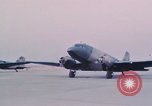 Image of camouflaged AC 47 aircraft Vietnam Bien Hoa Air Base, 1967, second 31 stock footage video 65675052032