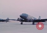 Image of camouflaged AC 47 aircraft Vietnam Bien Hoa Air Base, 1967, second 32 stock footage video 65675052032