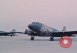 Image of camouflaged AC 47 aircraft Vietnam Bien Hoa Air Base, 1967, second 33 stock footage video 65675052032