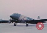 Image of camouflaged AC 47 aircraft Vietnam Bien Hoa Air Base, 1967, second 35 stock footage video 65675052032