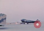 Image of camouflaged AC 47 aircraft Vietnam Bien Hoa Air Base, 1967, second 44 stock footage video 65675052032