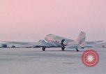 Image of camouflaged AC 47 aircraft Vietnam Bien Hoa Air Base, 1967, second 46 stock footage video 65675052032