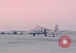 Image of camouflaged AC 47 aircraft Vietnam Bien Hoa Air Base, 1967, second 48 stock footage video 65675052032