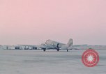 Image of camouflaged AC 47 aircraft Vietnam Bien Hoa Air Base, 1967, second 51 stock footage video 65675052032
