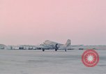 Image of camouflaged AC 47 aircraft Vietnam Bien Hoa Air Base, 1967, second 52 stock footage video 65675052032