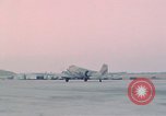 Image of camouflaged AC 47 aircraft Vietnam Bien Hoa Air Base, 1967, second 53 stock footage video 65675052032