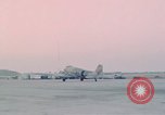 Image of camouflaged AC 47 aircraft Vietnam Bien Hoa Air Base, 1967, second 54 stock footage video 65675052032