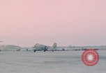 Image of camouflaged AC 47 aircraft Vietnam Bien Hoa Air Base, 1967, second 58 stock footage video 65675052032