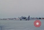 Image of camouflaged AC 47 aircraft Vietnam Bien Hoa Air Base, 1967, second 59 stock footage video 65675052032