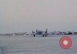 Image of camouflaged AC 47 aircraft Vietnam Bien Hoa Air Base, 1967, second 62 stock footage video 65675052032