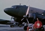 Image of camouflaged AC 47 aircraft Vietnam Bien Hoa Air Base, 1967, second 5 stock footage video 65675052033
