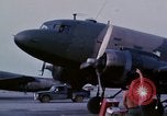 Image of camouflaged AC 47 aircraft Vietnam Bien Hoa Air Base, 1967, second 6 stock footage video 65675052033