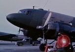 Image of camouflaged AC 47 aircraft Vietnam Bien Hoa Air Base, 1967, second 7 stock footage video 65675052033