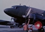 Image of camouflaged AC 47 aircraft Vietnam Bien Hoa Air Base, 1967, second 9 stock footage video 65675052033
