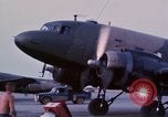Image of camouflaged AC 47 aircraft Vietnam Bien Hoa Air Base, 1967, second 17 stock footage video 65675052033