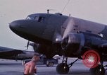 Image of camouflaged AC 47 aircraft Vietnam Bien Hoa Air Base, 1967, second 18 stock footage video 65675052033