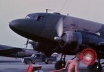 Image of camouflaged AC 47 aircraft Vietnam Bien Hoa Air Base, 1967, second 19 stock footage video 65675052033