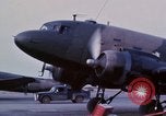 Image of camouflaged AC 47 aircraft Vietnam Bien Hoa Air Base, 1967, second 20 stock footage video 65675052033