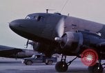 Image of camouflaged AC 47 aircraft Vietnam Bien Hoa Air Base, 1967, second 21 stock footage video 65675052033