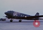 Image of camouflaged AC 47 aircraft Vietnam Bien Hoa Air Base, 1967, second 22 stock footage video 65675052033