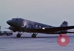 Image of camouflaged AC 47 aircraft Vietnam Bien Hoa Air Base, 1967, second 23 stock footage video 65675052033