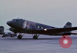 Image of camouflaged AC 47 aircraft Vietnam Bien Hoa Air Base, 1967, second 24 stock footage video 65675052033