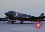 Image of camouflaged AC 47 aircraft Vietnam Bien Hoa Air Base, 1967, second 26 stock footage video 65675052033