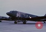 Image of camouflaged AC 47 aircraft Vietnam Bien Hoa Air Base, 1967, second 28 stock footage video 65675052033