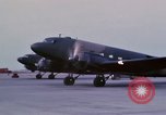 Image of camouflaged AC 47 aircraft Vietnam Bien Hoa Air Base, 1967, second 30 stock footage video 65675052033