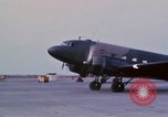 Image of camouflaged AC 47 aircraft Vietnam Bien Hoa Air Base, 1967, second 32 stock footage video 65675052033