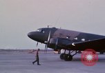 Image of camouflaged AC 47 aircraft Vietnam Bien Hoa Air Base, 1967, second 34 stock footage video 65675052033