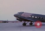 Image of camouflaged AC 47 aircraft Vietnam Bien Hoa Air Base, 1967, second 37 stock footage video 65675052033