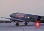 Image of camouflaged AC 47 aircraft Vietnam Bien Hoa Air Base, 1967, second 38 stock footage video 65675052033