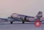 Image of camouflaged AC 47 aircraft Vietnam Bien Hoa Air Base, 1967, second 41 stock footage video 65675052033