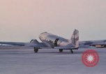 Image of camouflaged AC 47 aircraft Vietnam Bien Hoa Air Base, 1967, second 44 stock footage video 65675052033